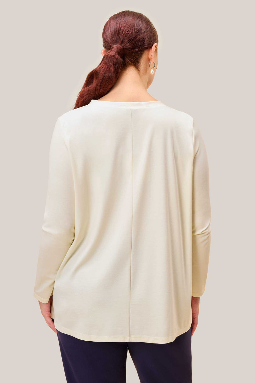Back view of plus size cream jersey top showing centre seam and soft drape. THE HOUR PLUSSIZE