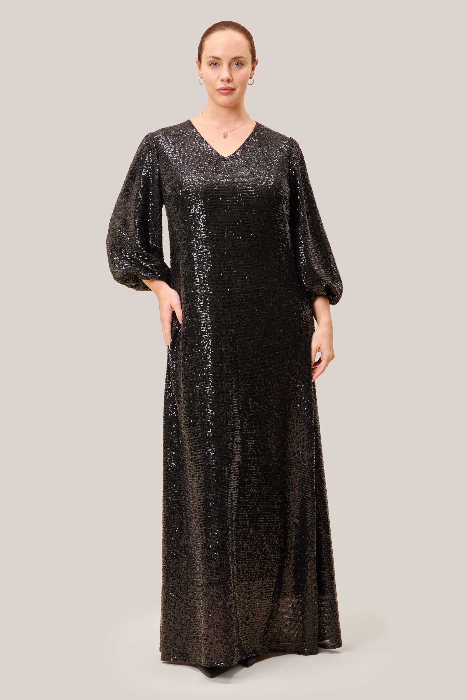PLUS SIZE floor-length black sequin gown with a V-neckline and statement sleeves by THE HOUR
