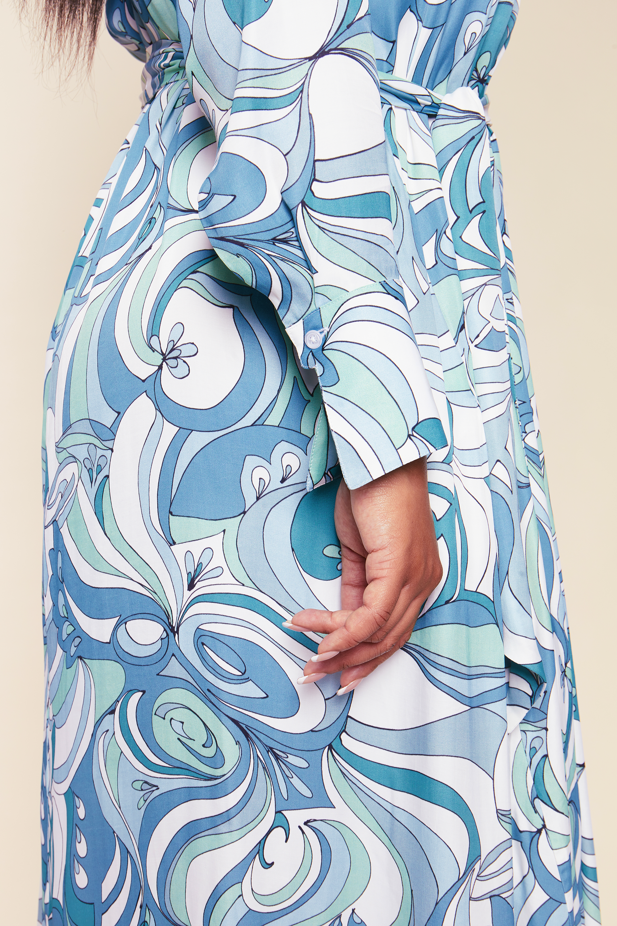 Vibrant Print Plus-size Shirt Dress satin viscose with a swirling print in an aqua colour pallet with buttoned cuffs. THE HOUR
