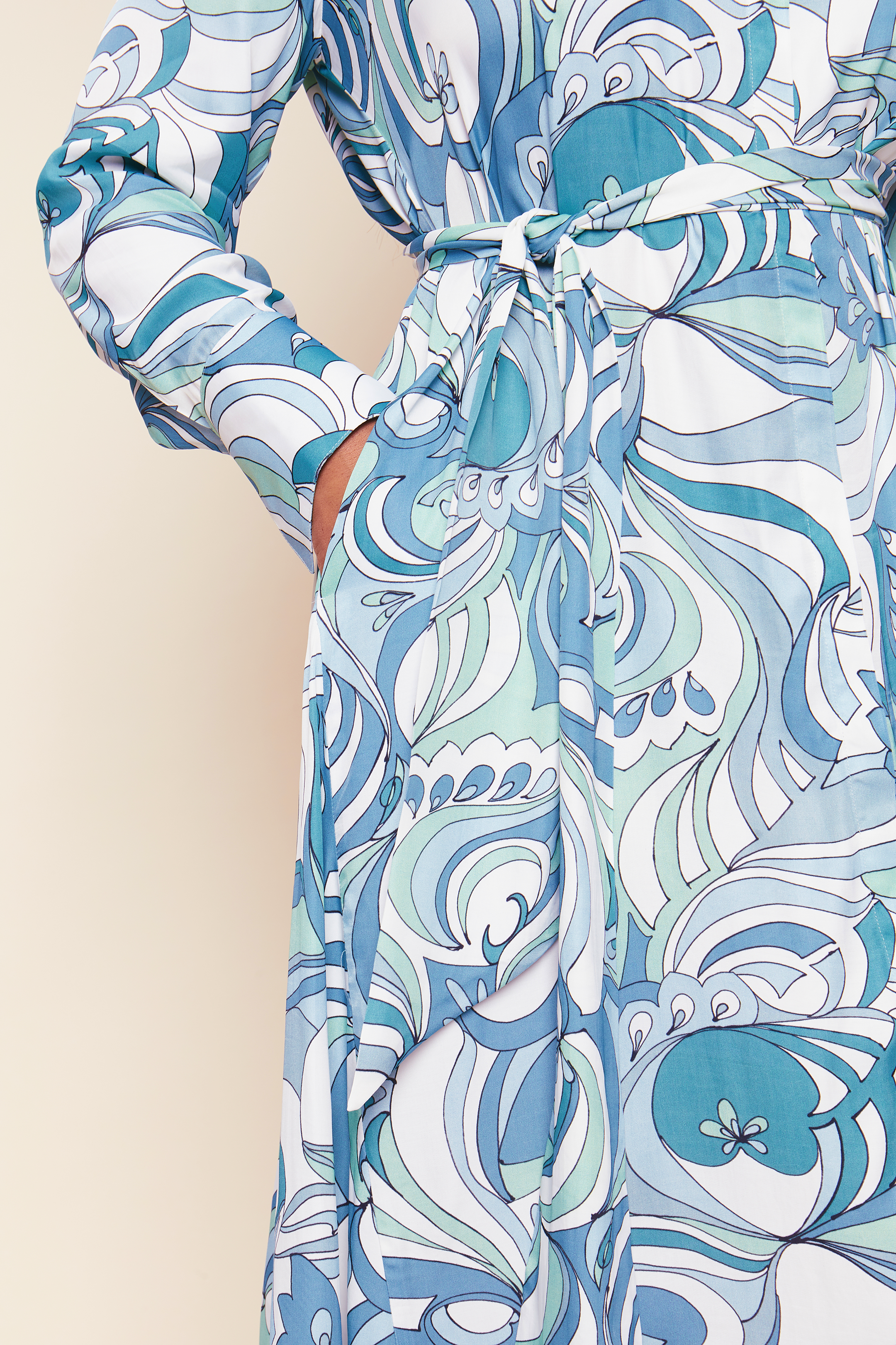 Vibrant Print Plus-size Shirt Dress satin viscose with a swirling print in an aqua colour pallet. Belt.THE HOUR