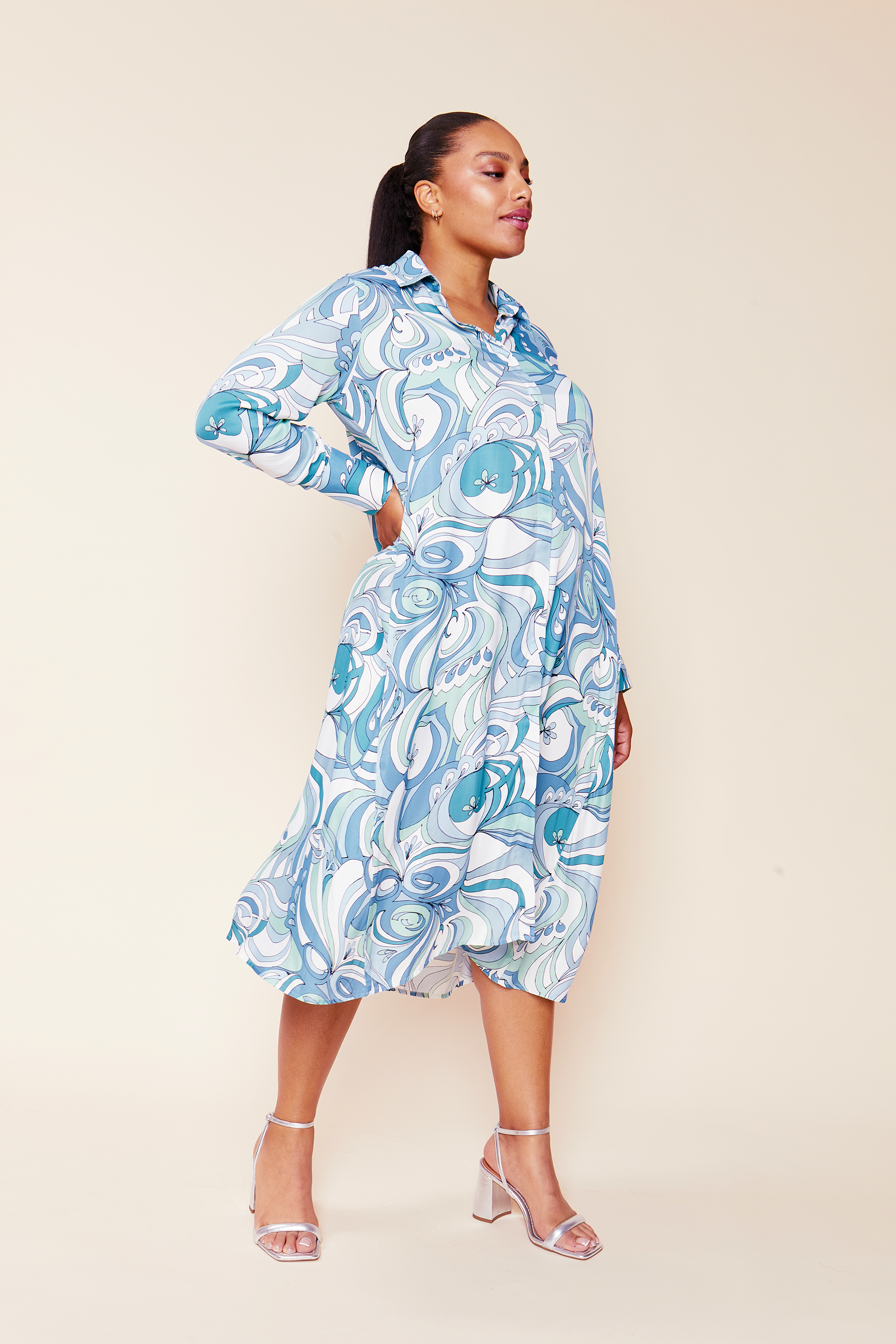 Vibrant Print Plus-size Shirt Dress satin viscose with a swirling print in an aqua colour pallet with removable belt.THE HOUR