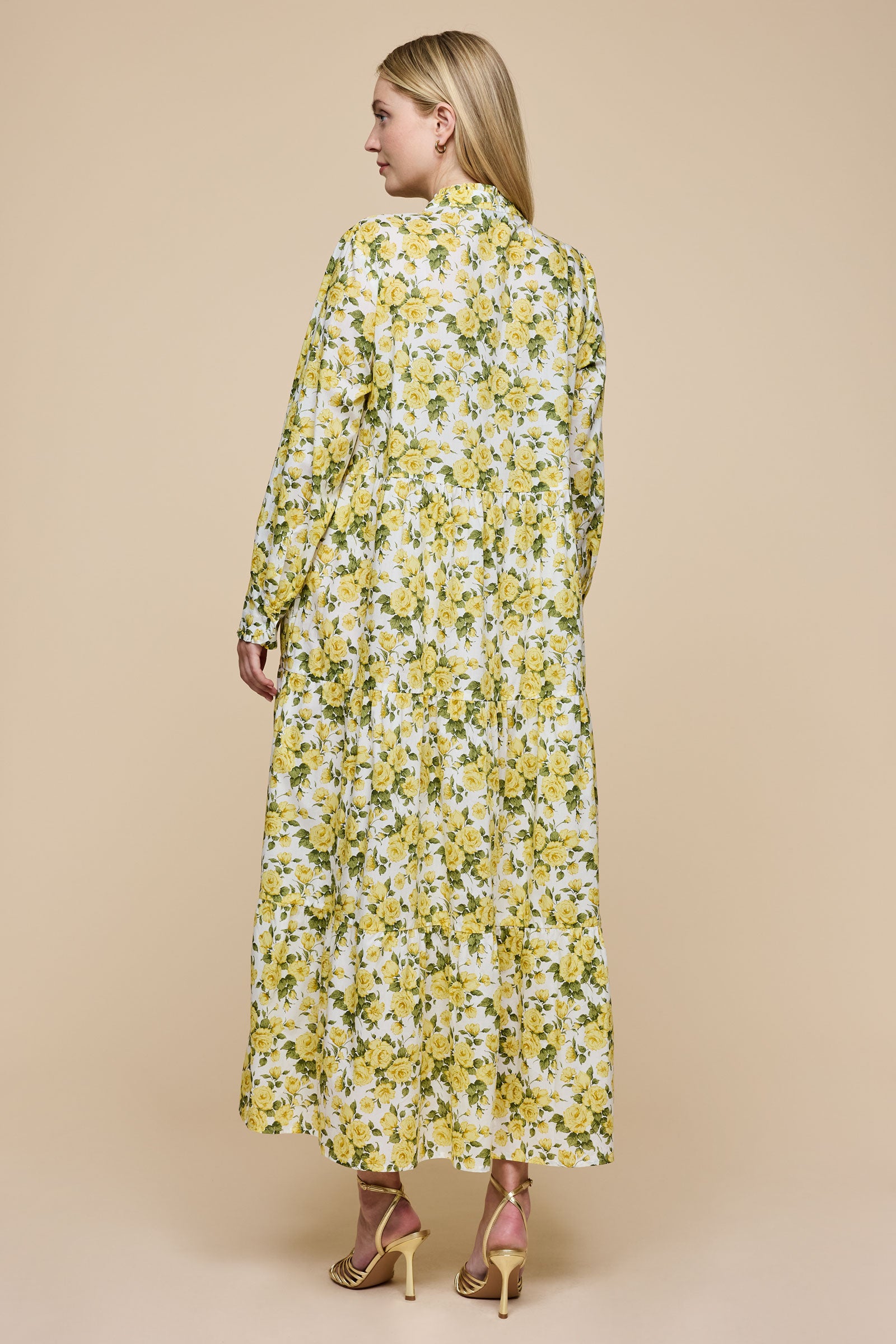Plus size Tiered Maxi Dress Yellow Roses Print from the back THE HOUR