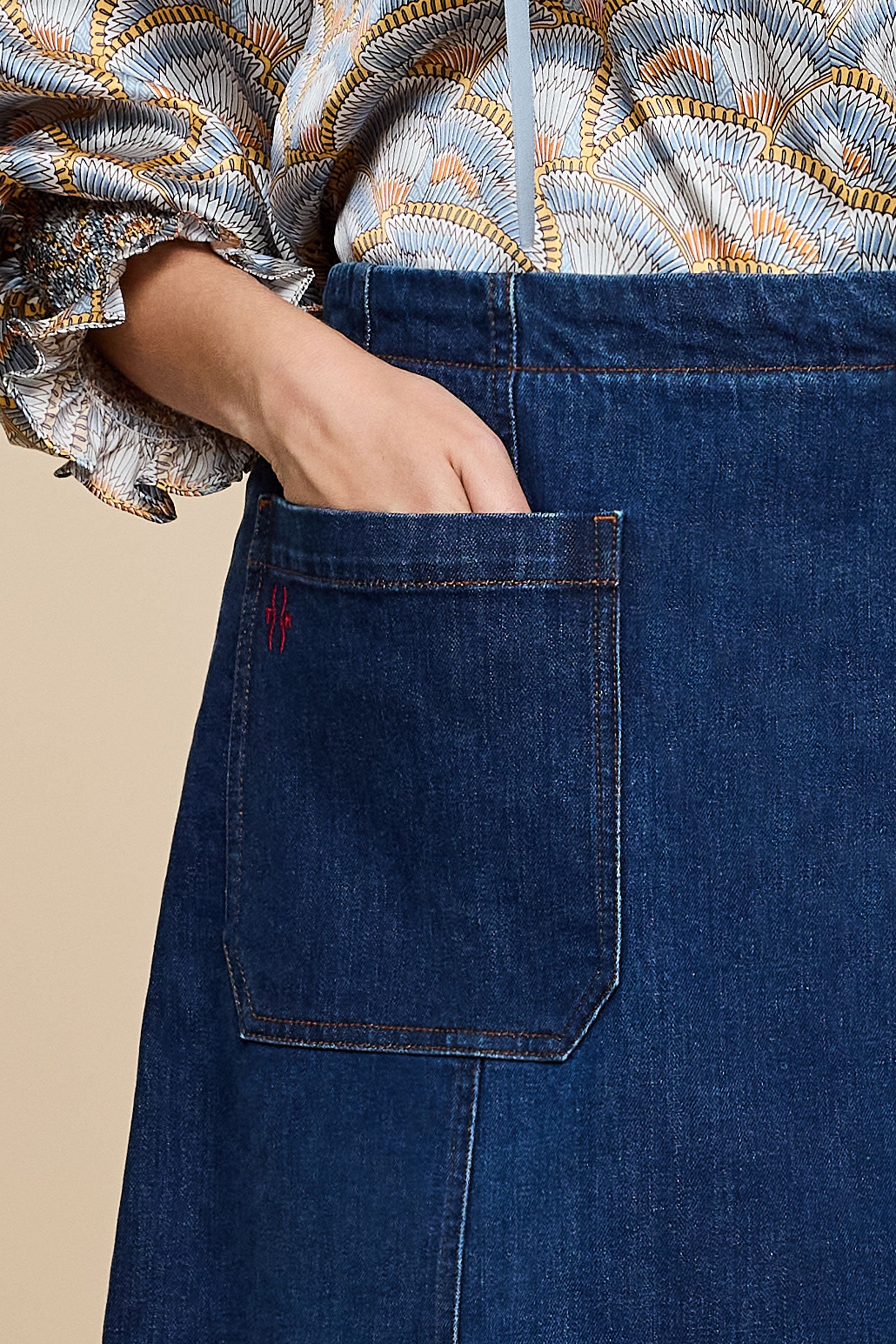Close-up of stitching and pocket design – The Hour denim skirt