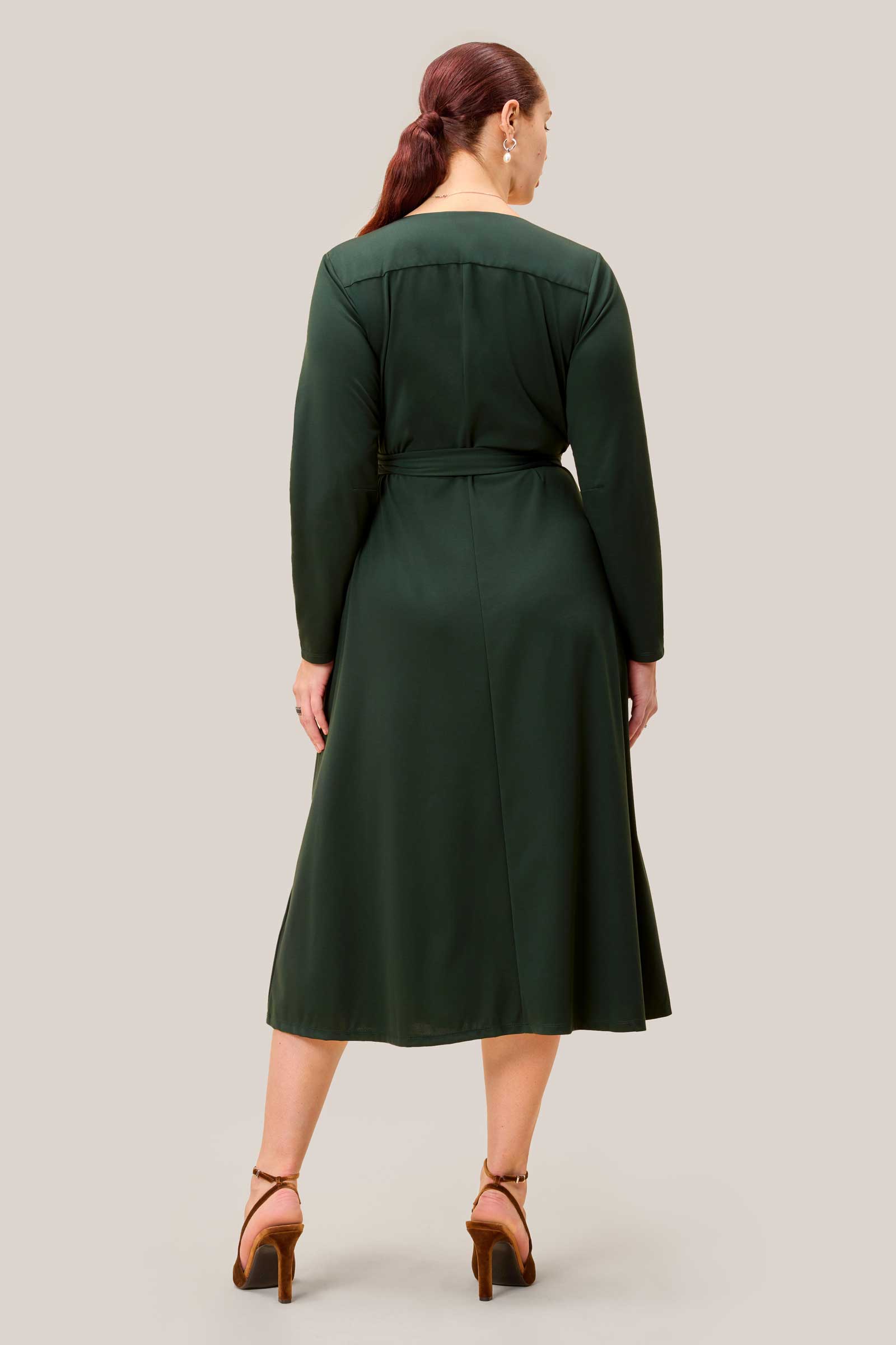 Back view of plus size olive green jersey midi dress with long sleeves – The Hour