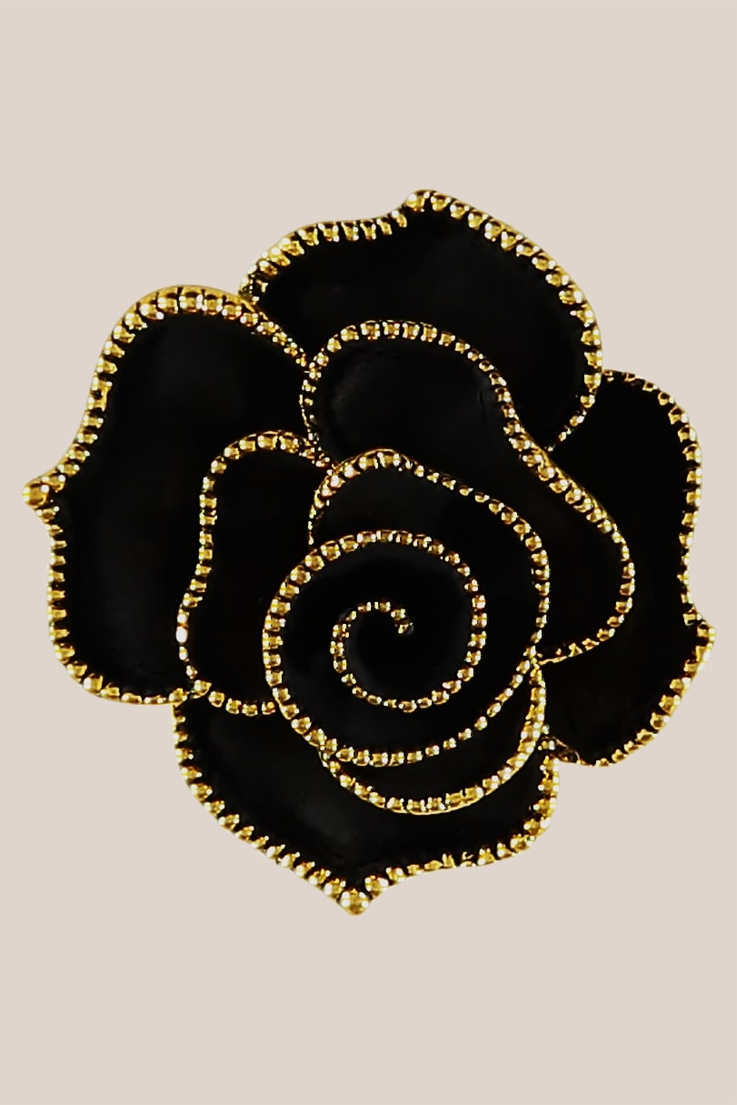 Matt black and gold rose brooch with pin fastening 